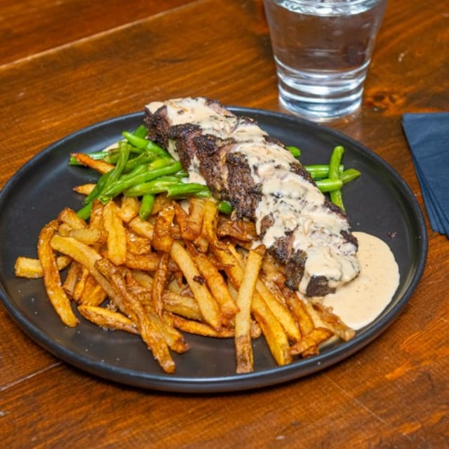 Tri Peppercorn Crusted Flat Iron Steak.